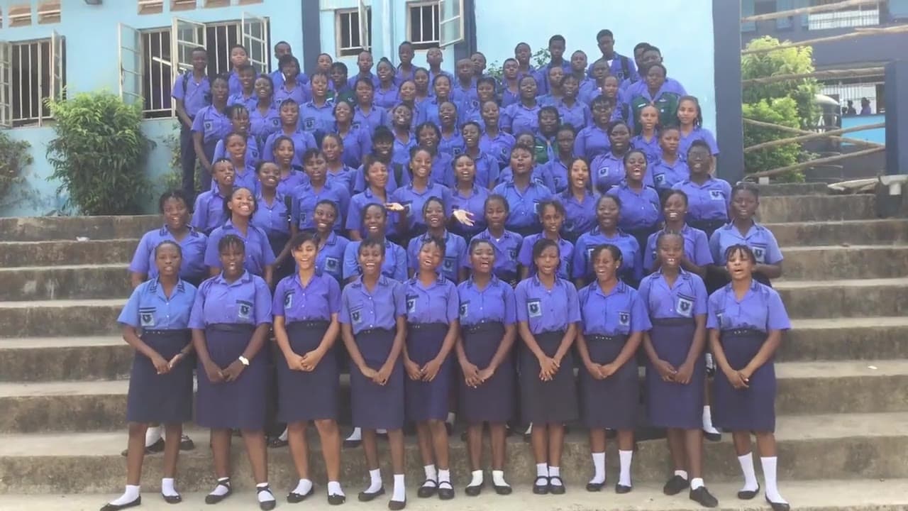 Students of The International School Limited gathered on the front steps
